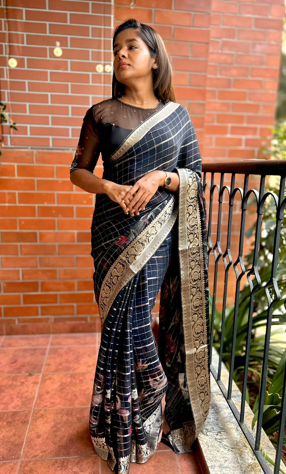 Black floral chiffon saree with black hand worked blouse