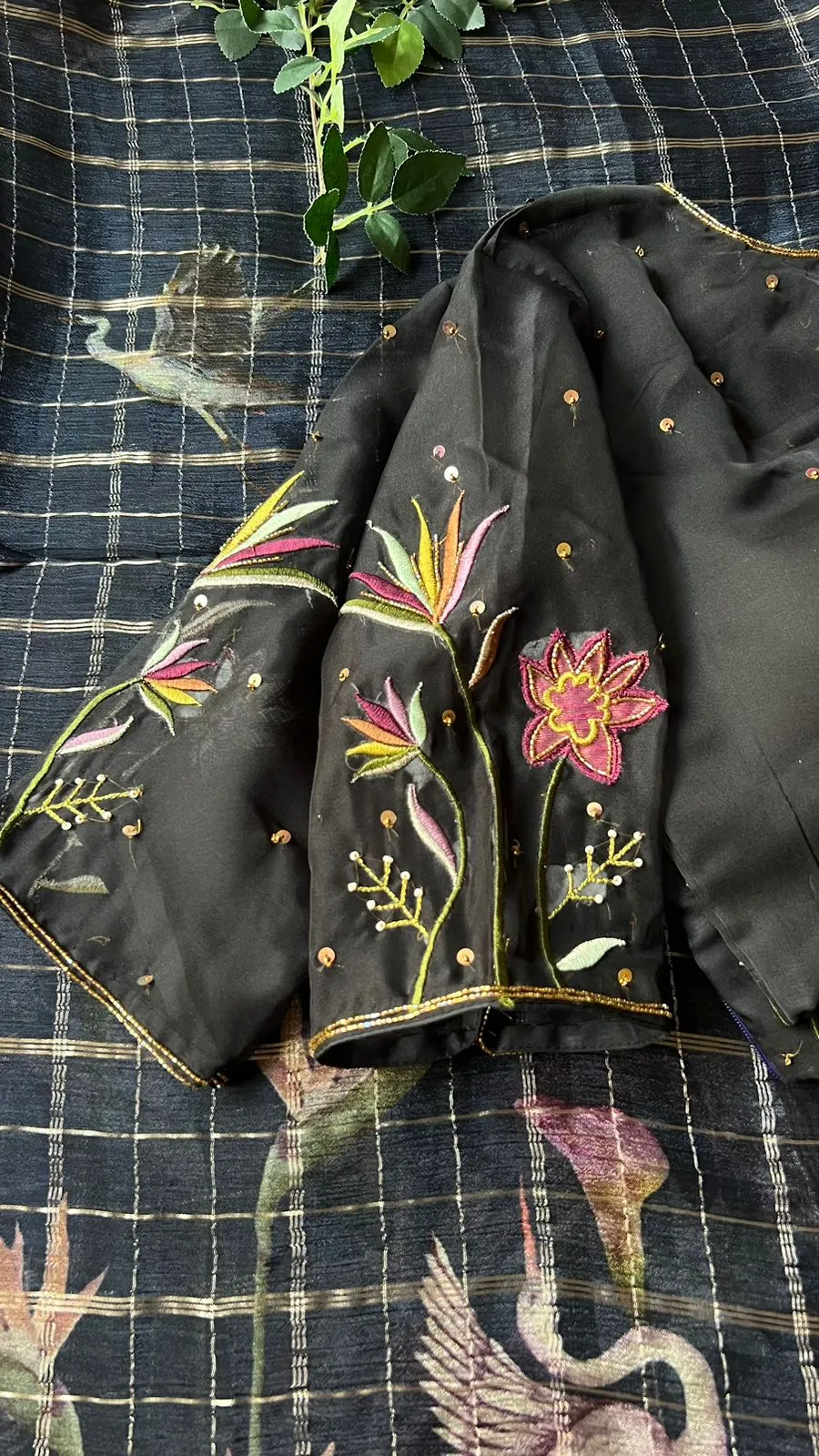 Black floral chiffon saree with black hand worked blouse