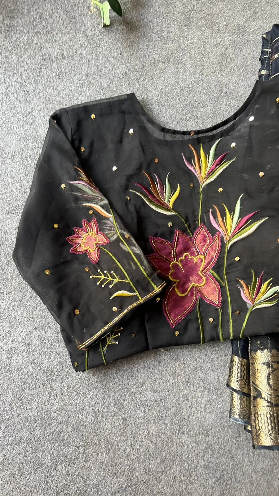 Black floral chiffon saree with black hand worked blouse
