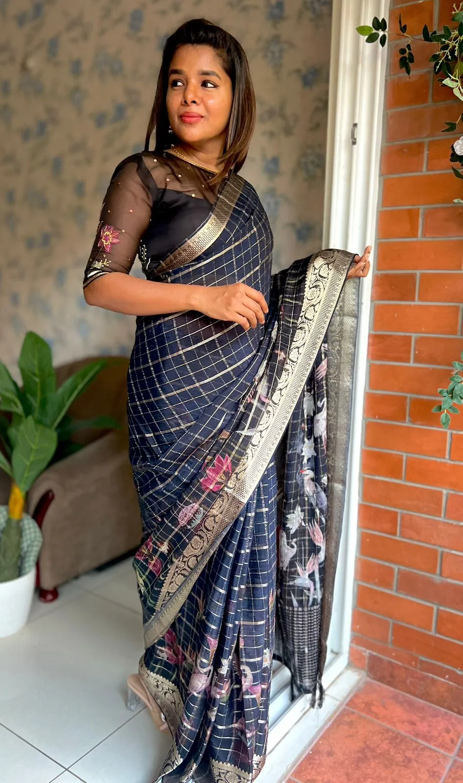 Black floral chiffon saree with black hand worked blouse