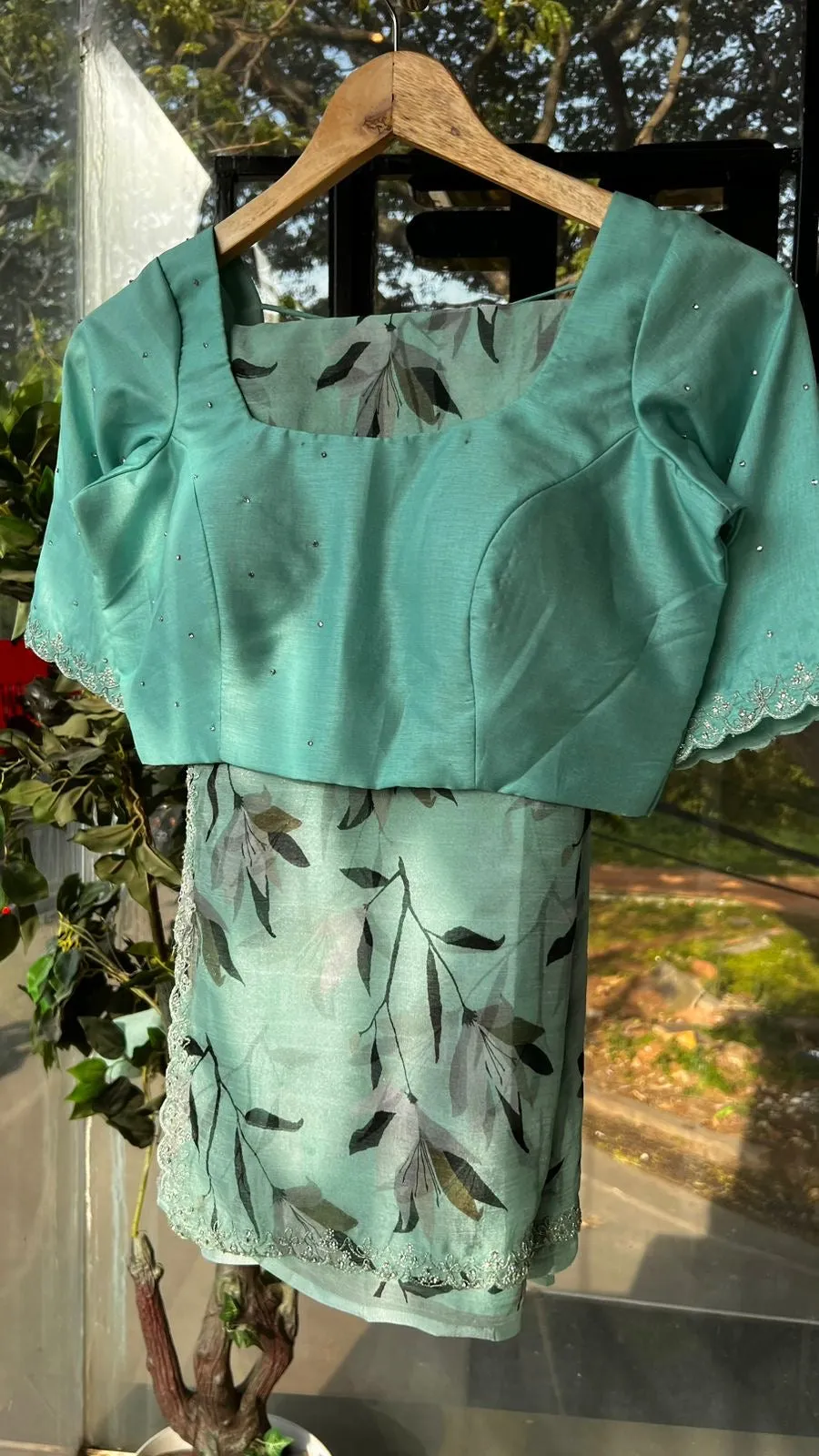 Cyan blue chiffon saree with hand worked blouse