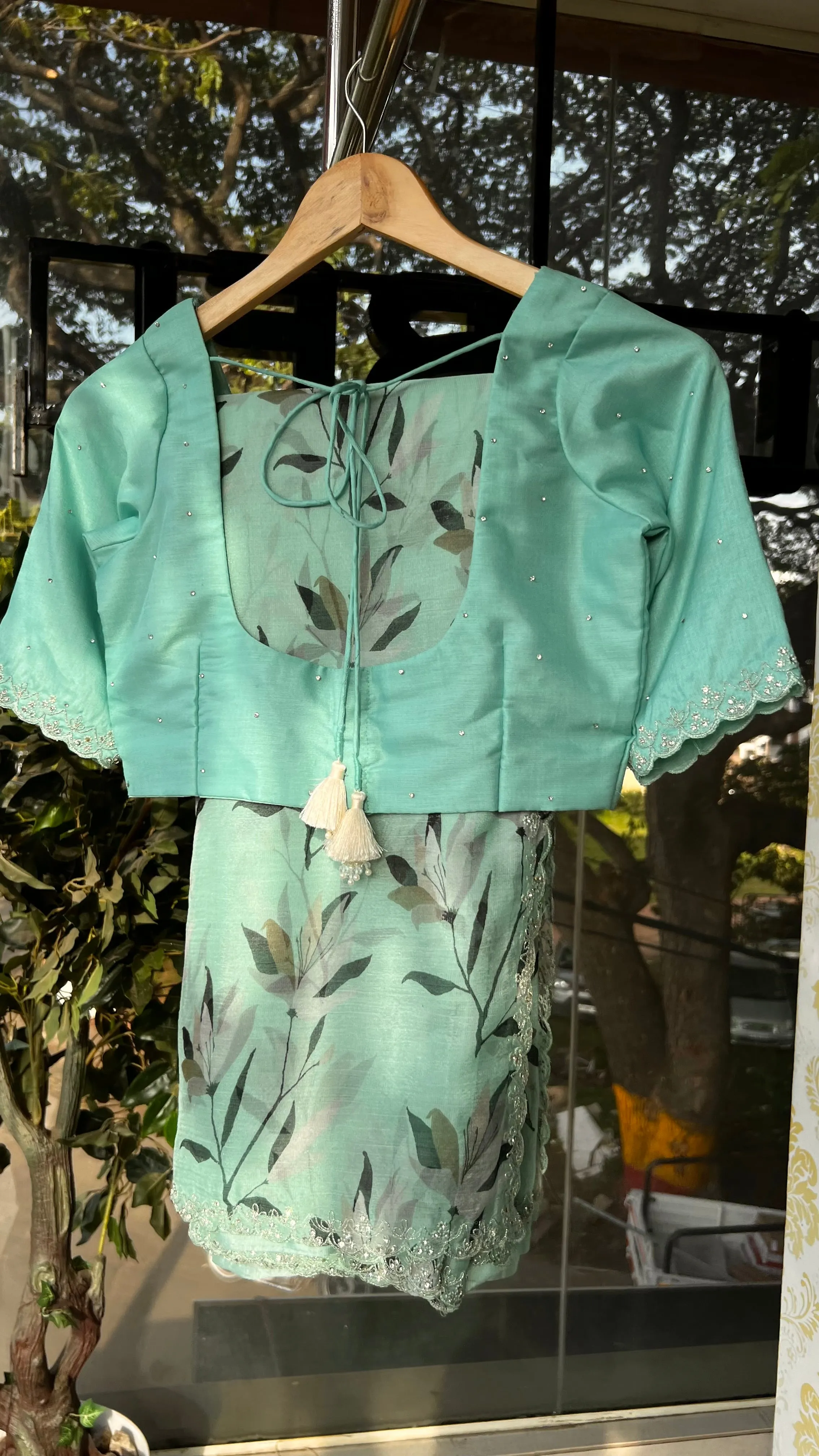 Cyan blue chiffon saree with hand worked blouse