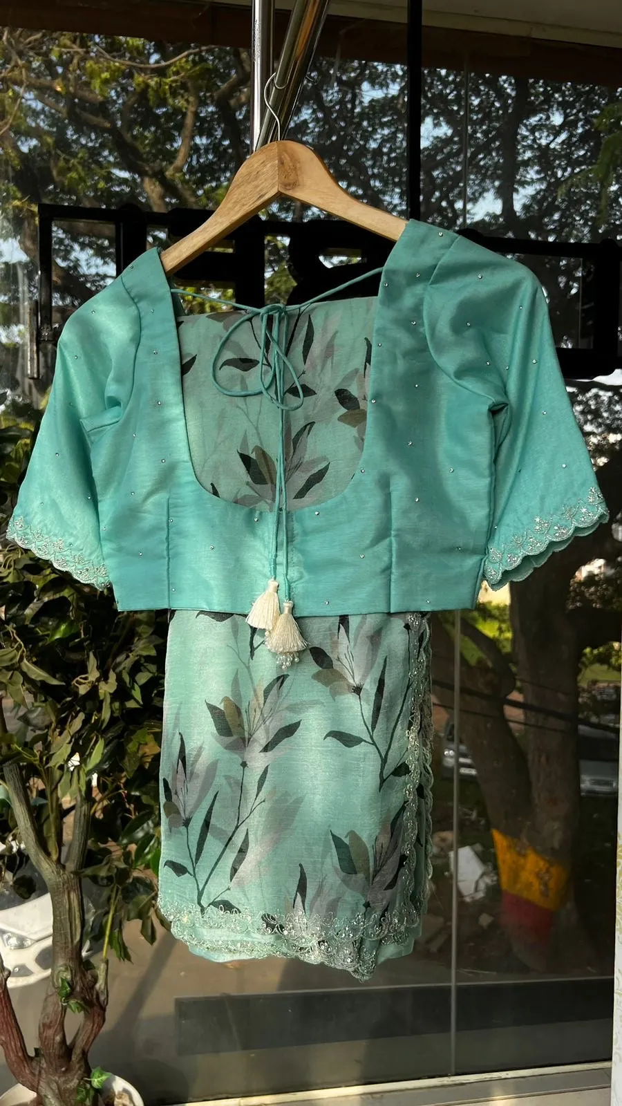 Cyan blue chiffon saree with hand worked blouse