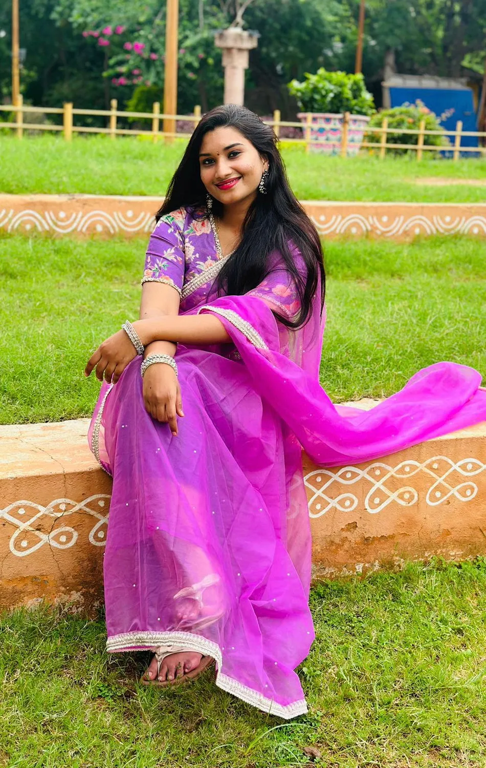 Lavender organza saree with pearl hand work blouse