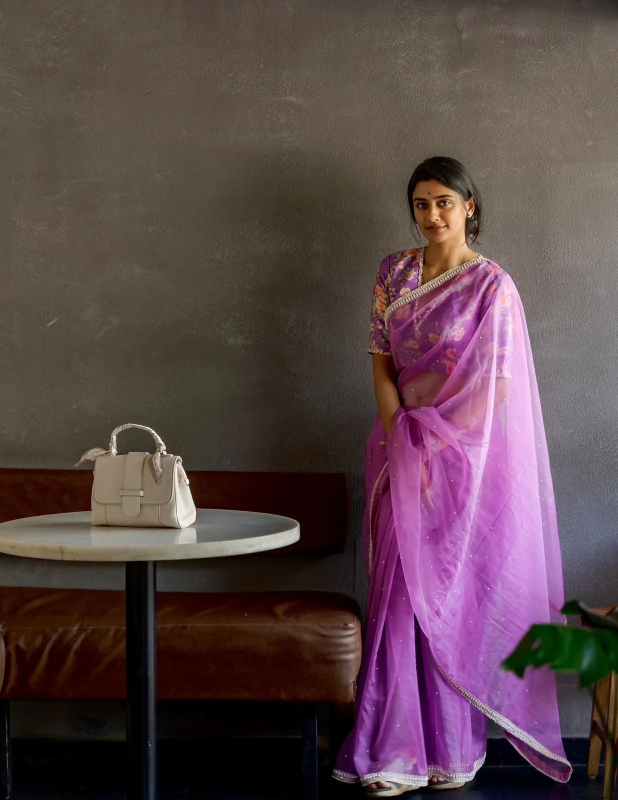 Lavender organza saree with pearl hand work blouse