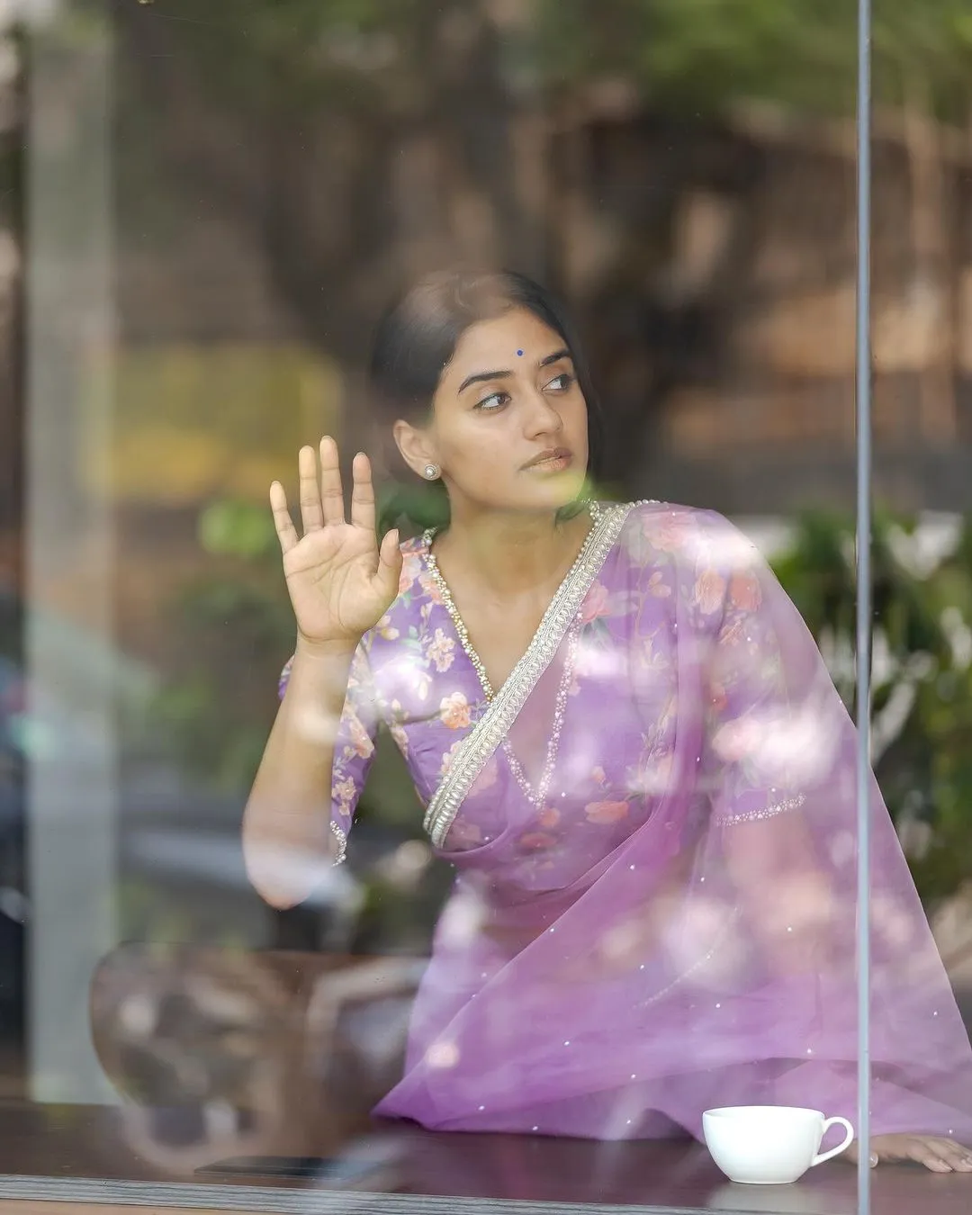 Lavender organza saree with pearl hand work blouse