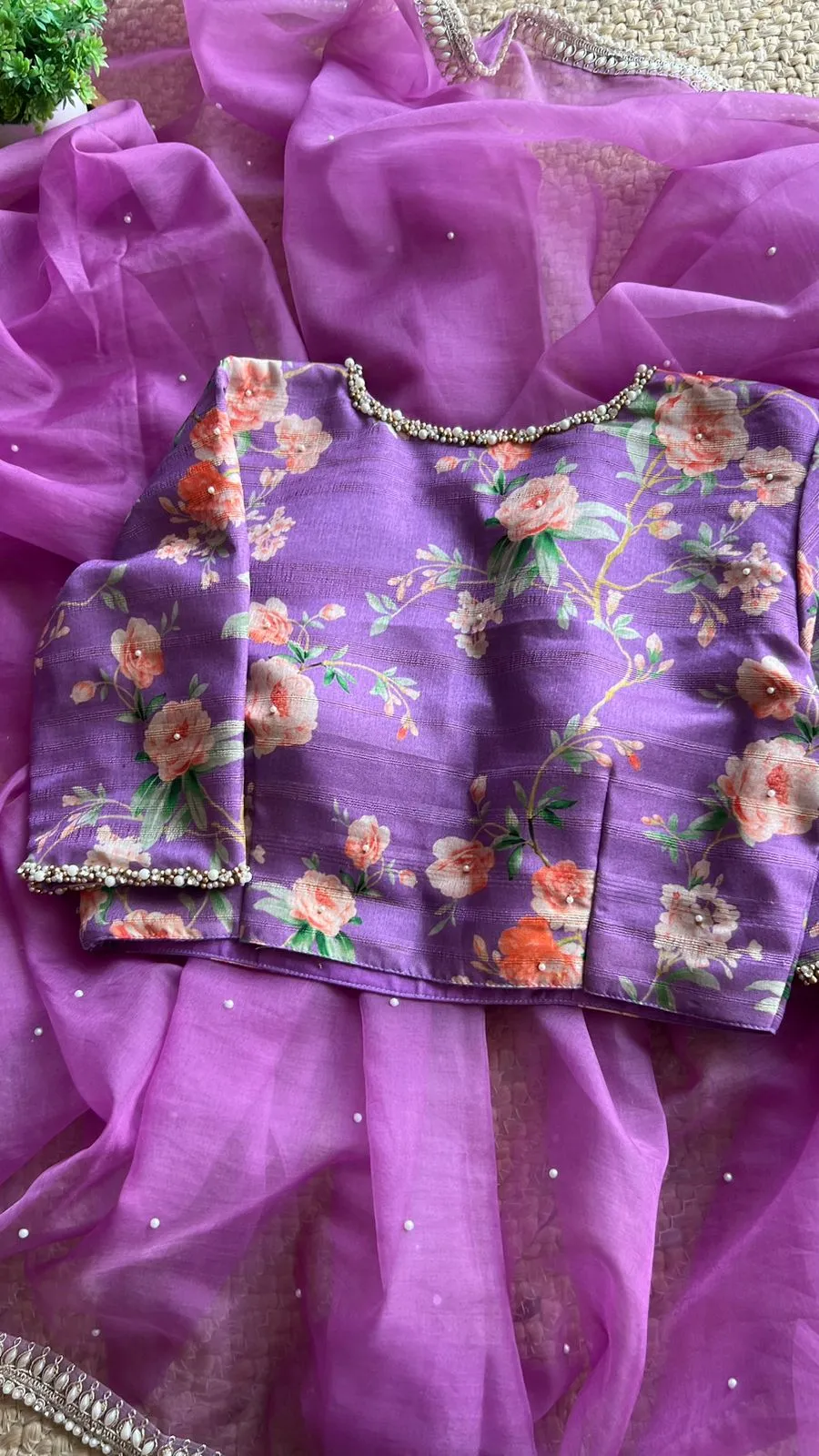 Lavender organza saree with pearl hand work blouse