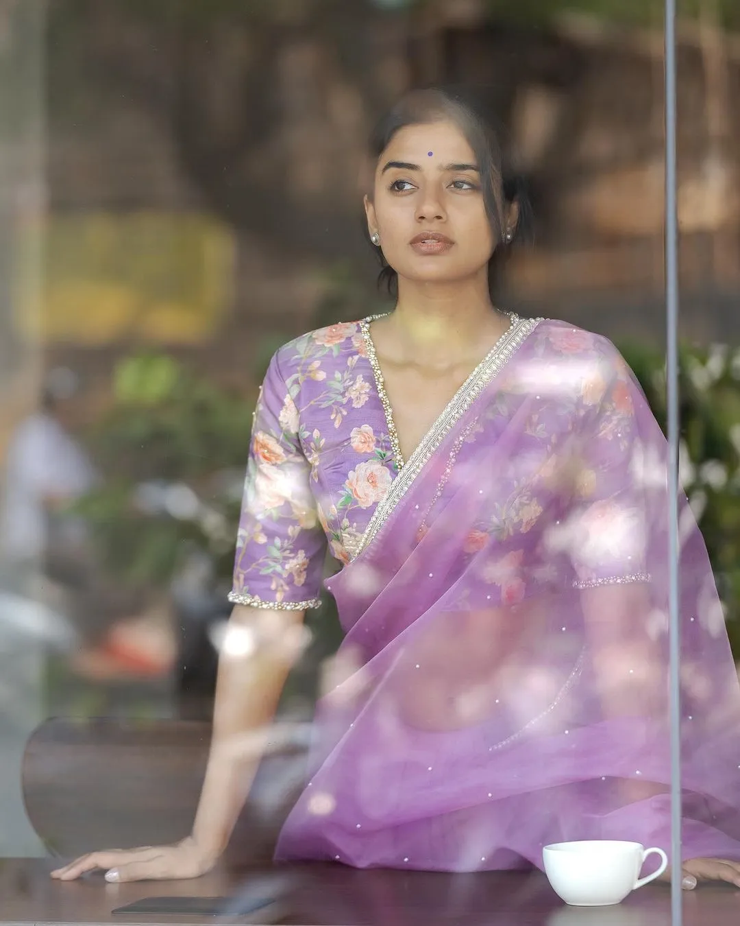 Lavender organza saree with pearl hand work blouse