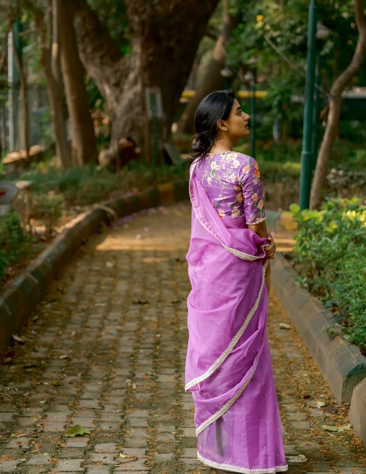 Lavender organza saree with pearl hand work blouse