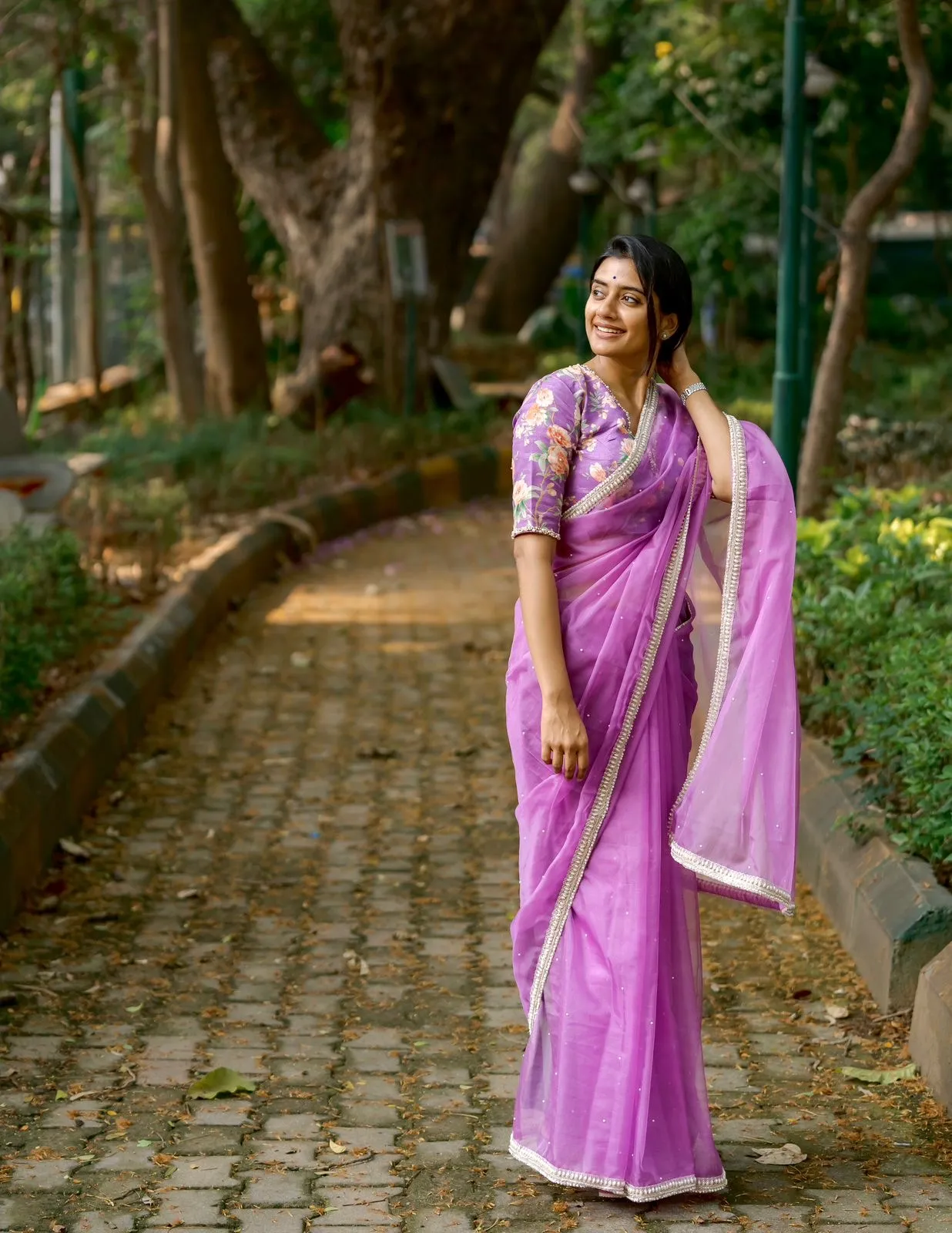 Lavender organza saree with pearl hand work blouse