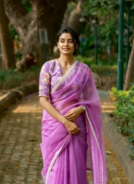 Lavender organza saree with pearl hand work blouse