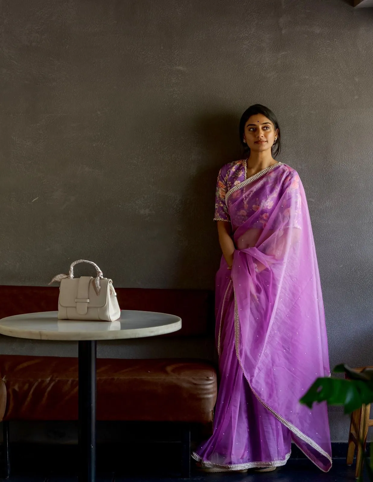 Lavender organza saree with pearl hand work blouse