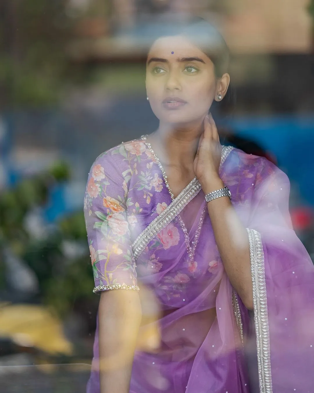 Lavender organza saree with pearl hand work blouse