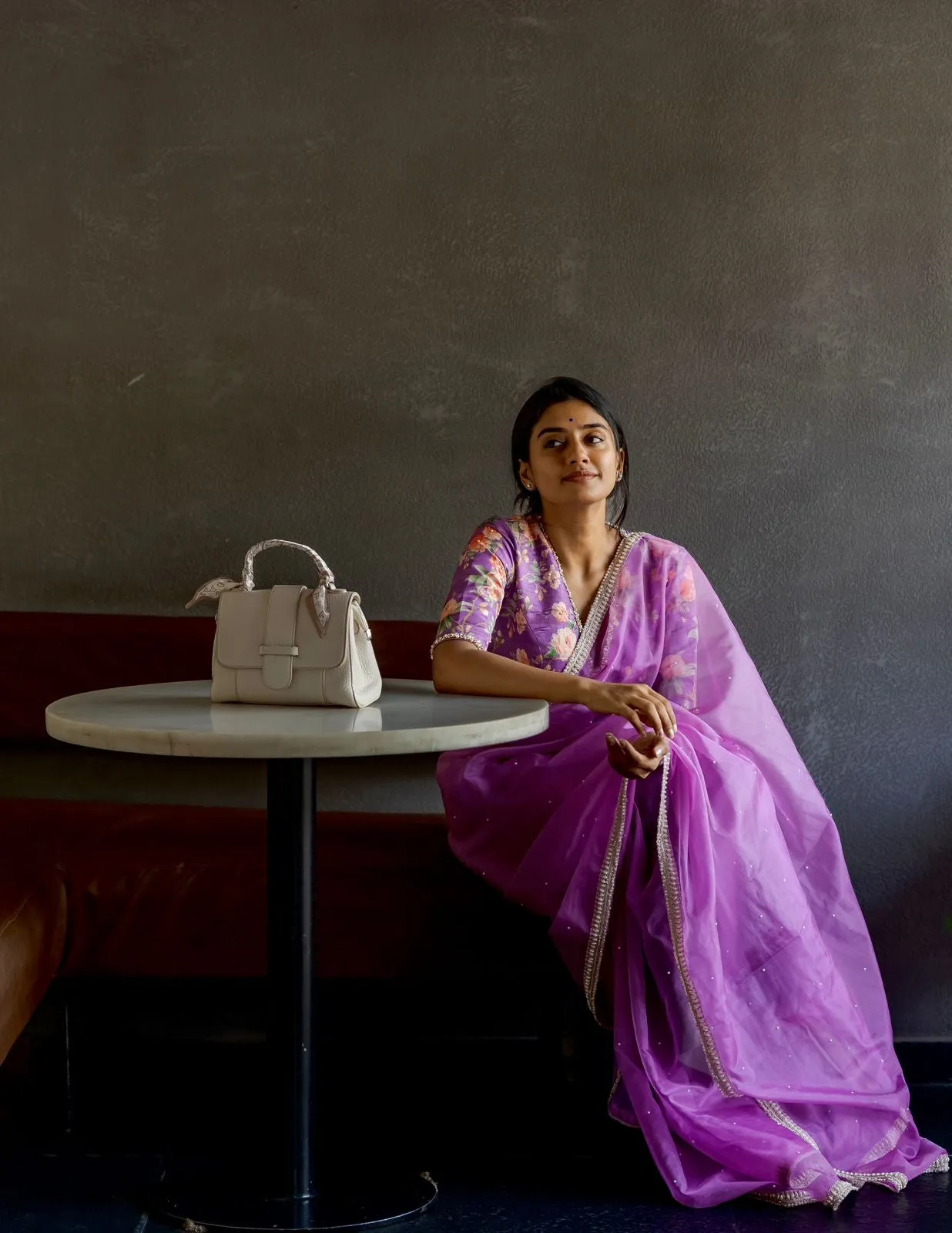 Lavender organza saree with pearl hand work blouse