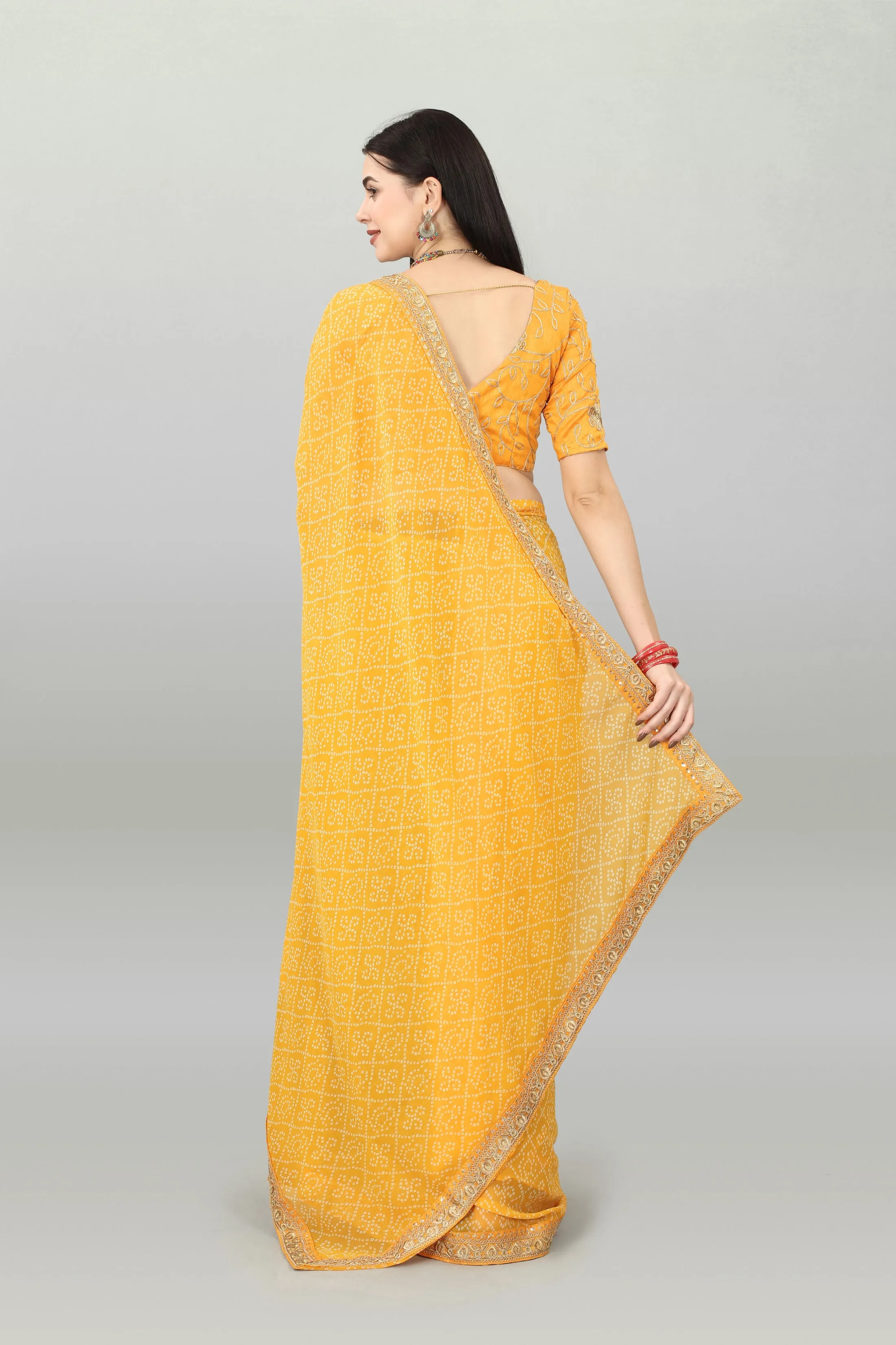 Women Party Wear Bandhani Printed Yellow Colour Georgette Saree Collection