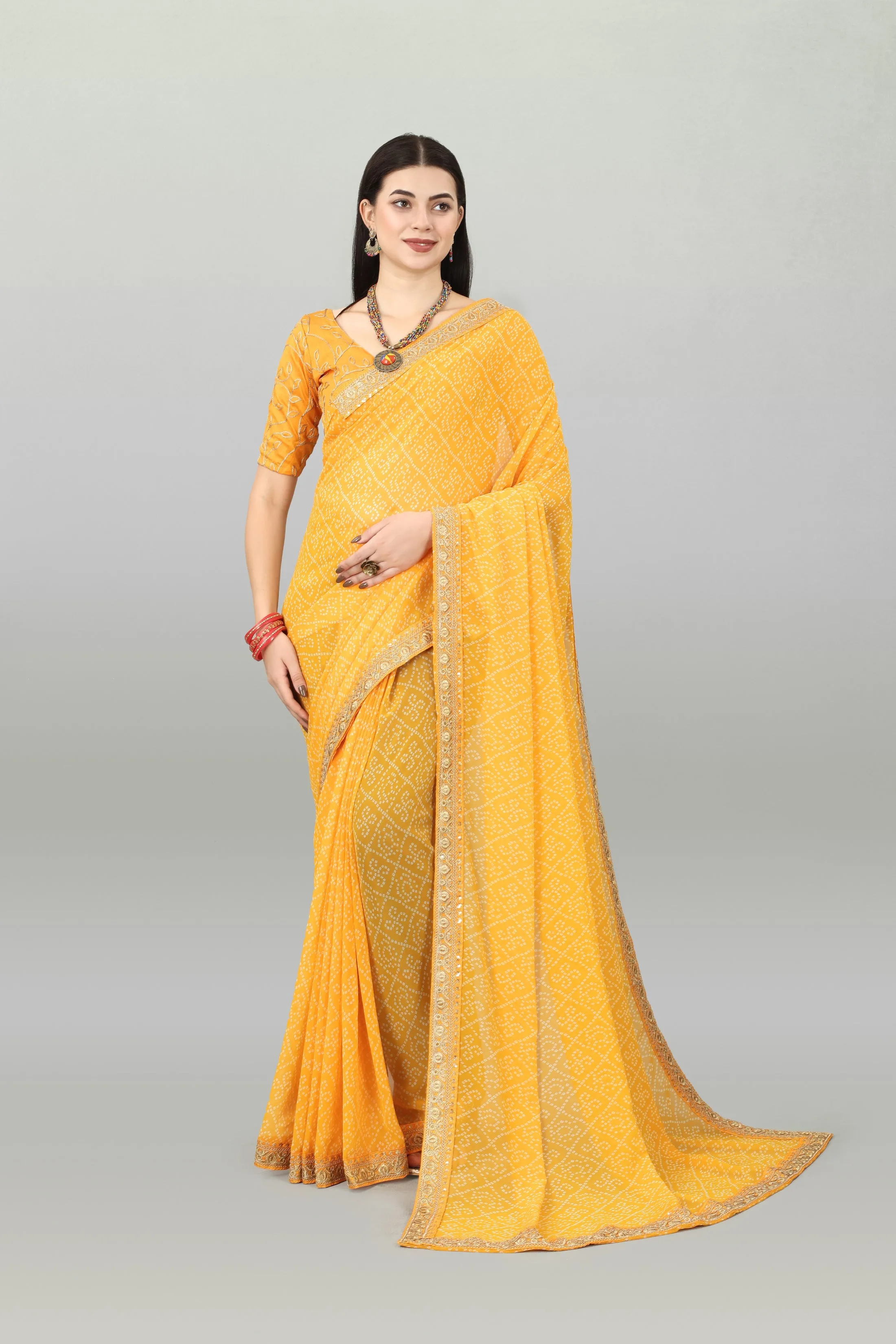 Women Party Wear Bandhani Printed Yellow Colour Georgette Saree Collection