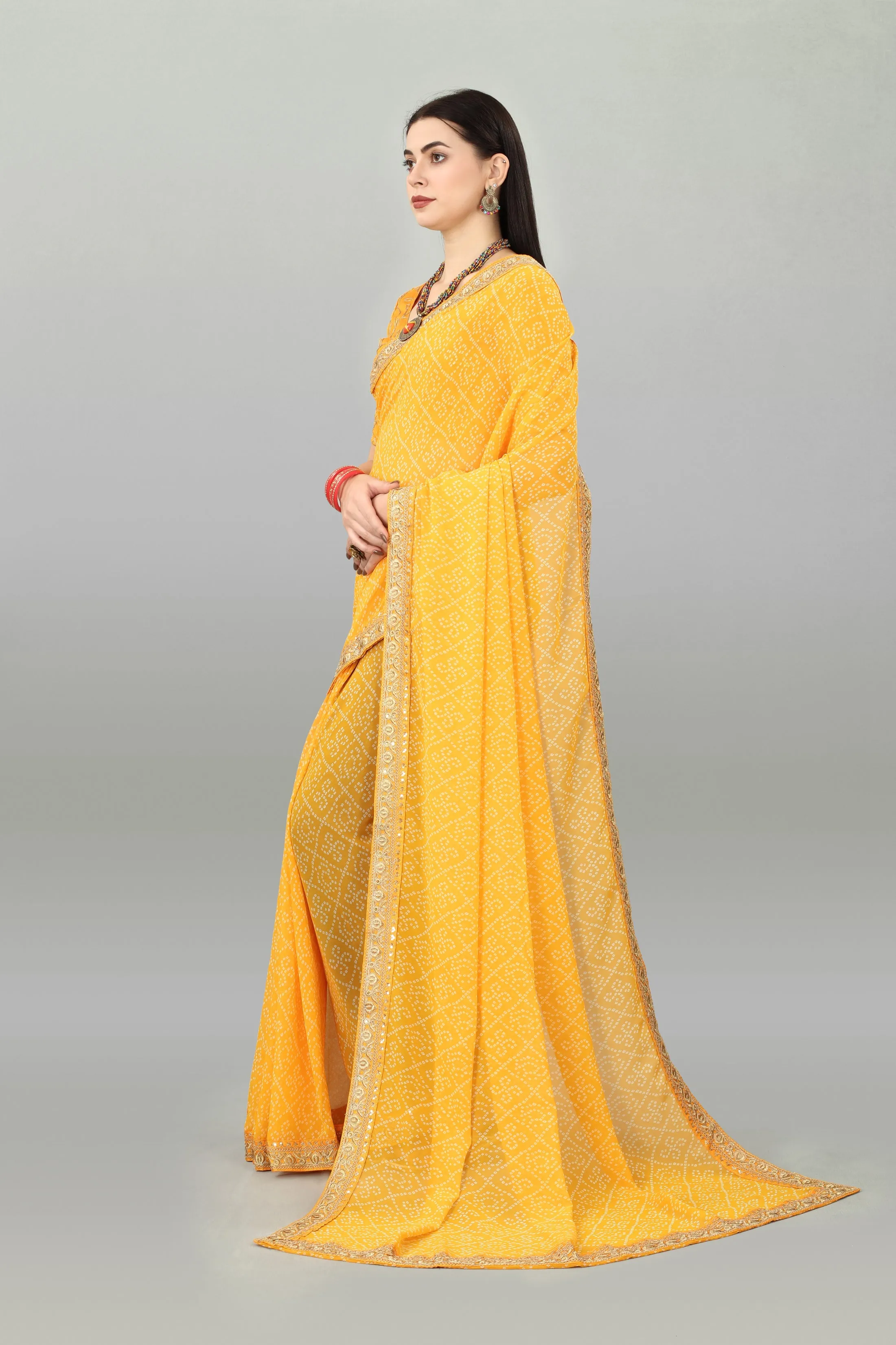 Women Party Wear Bandhani Printed Yellow Colour Georgette Saree Collection
